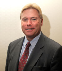John E. Courtney, Ph.D.